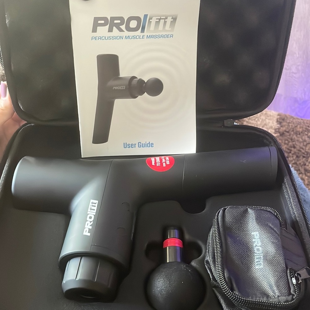 Brand new, PRO fit muscle massager, come with case and 4 different heads.